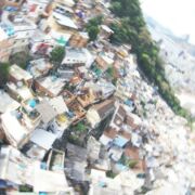 Radially blurred aerial view of favelas in Rio de Janeiro's Santa Marts hill region.