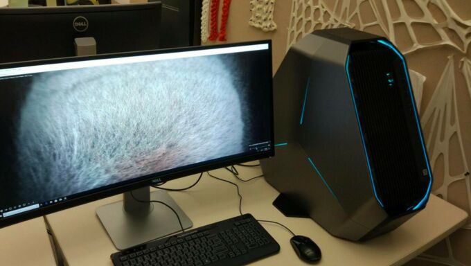 Advanced geometric modeling workstation with curved widescreen monitor in the Penn State SCDC AdvGeomLab