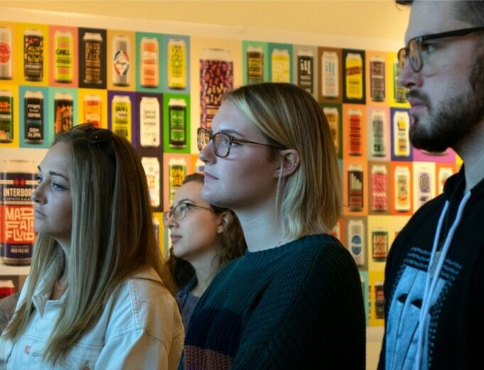 A look inside the Rouse Gallery at the “Heads of State" exhibit, featuring a series of colorful posters of major U.S. cities and more.