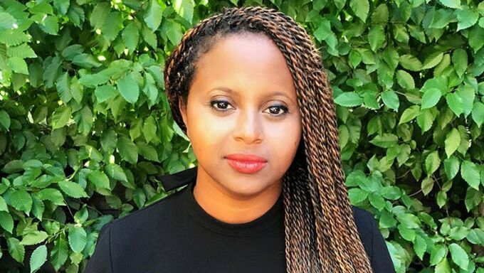 Portrait of Sara Zewde in front of an ivy background