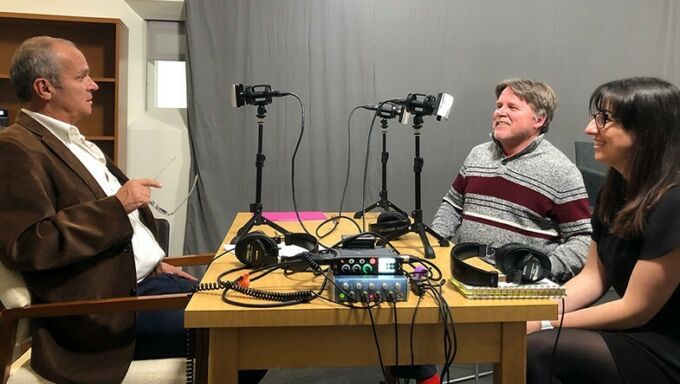 Keith Bowers, left, talks with Andy Cole and Kendall Mainzer, at. right.