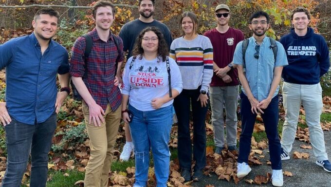 The eight students in LARCH 414: Advanced Design Studio pose during a field trip to Baltimore.