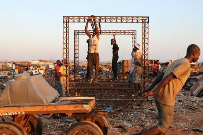 Students work to build the Spacecraft_ZKM in Agbogbloshie.