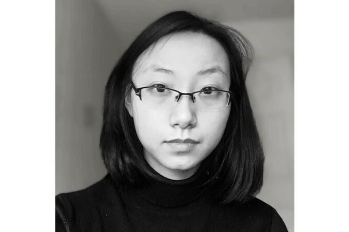 Black and white headshot of Xi Jin