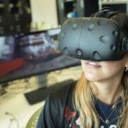 Photo of female student wearing an augmented reality headset.